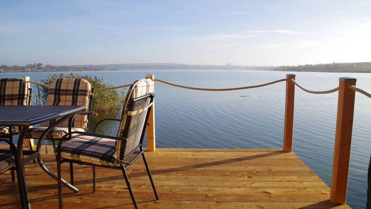 Kahnsdorf House | Modern holiday home directly in Hainer lake with boat
