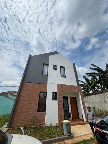 South Tangerang House | Modern Home of Sun Patio & BBQ & Coffee at Bintaro 9