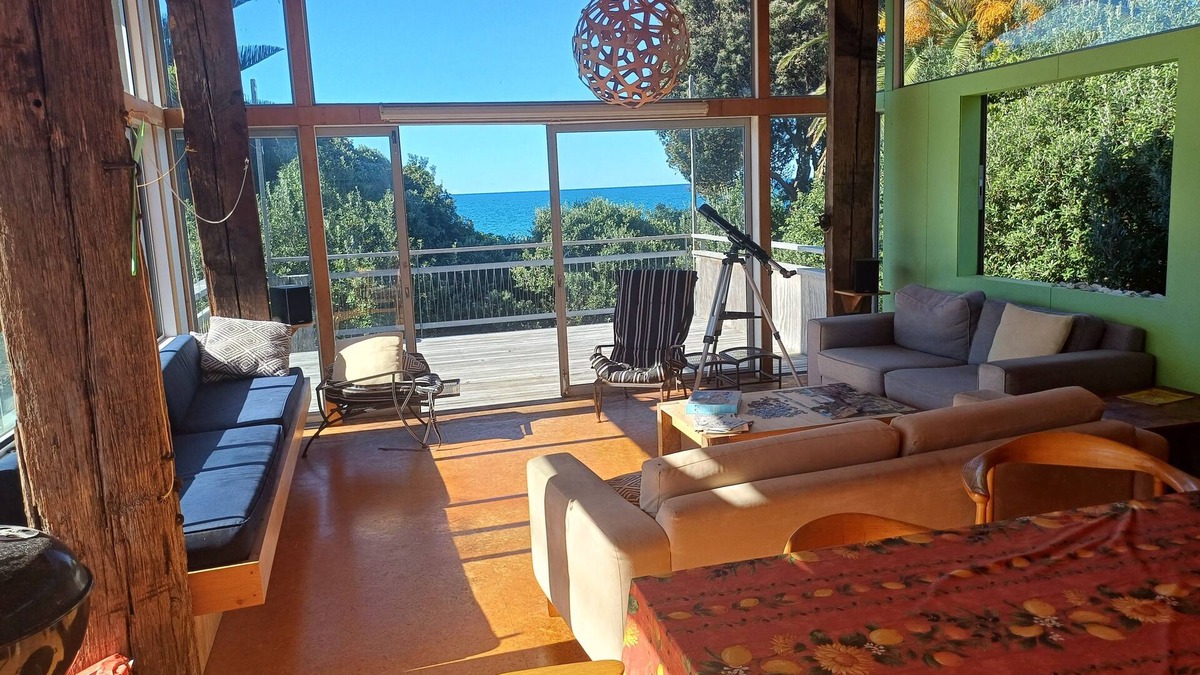 Whiritoa House | Modern Kiwi family bach right on the beach. Private & pet friendly.