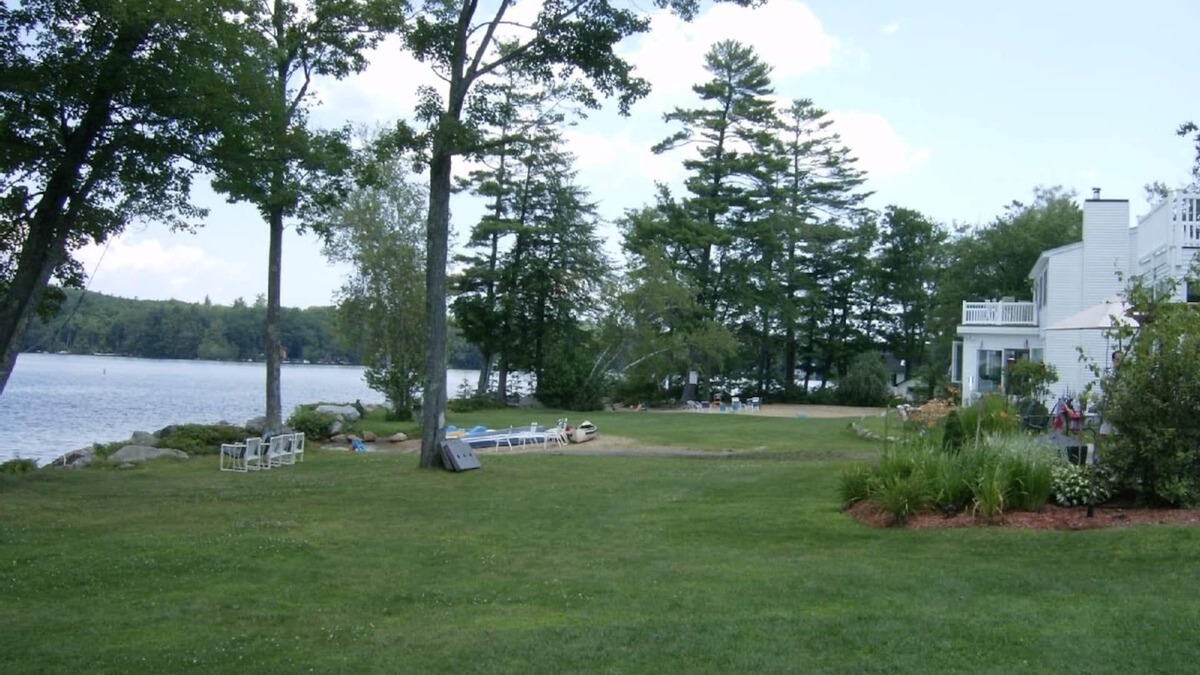 Meredith House | Modern lakefront home on Lake Waukewan with spectacular fall folliage views!