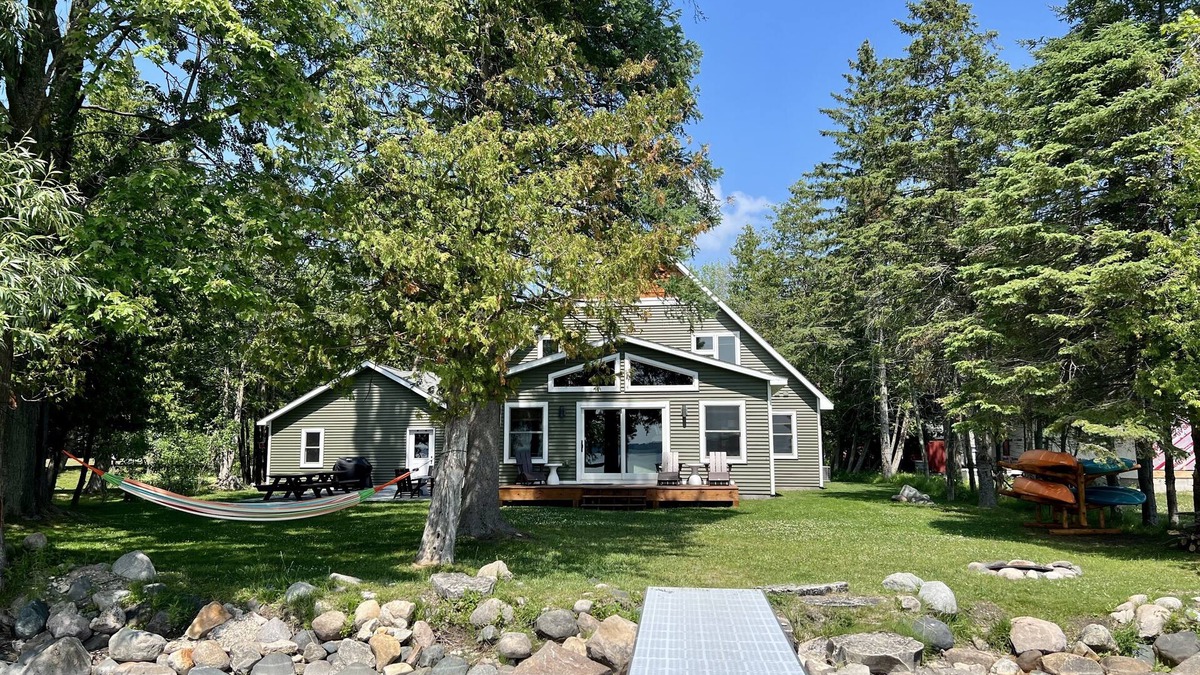 Cheboygan County House | Modern Lakefront Home on Burt w/Optional Pontoon