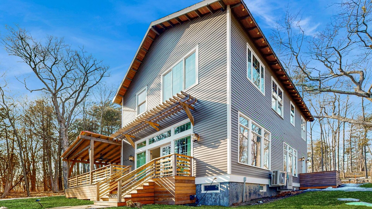 Charlotte House | Modern lakehouse w/private beach, dock, fireplace, gym, theater, jacuzzi tub