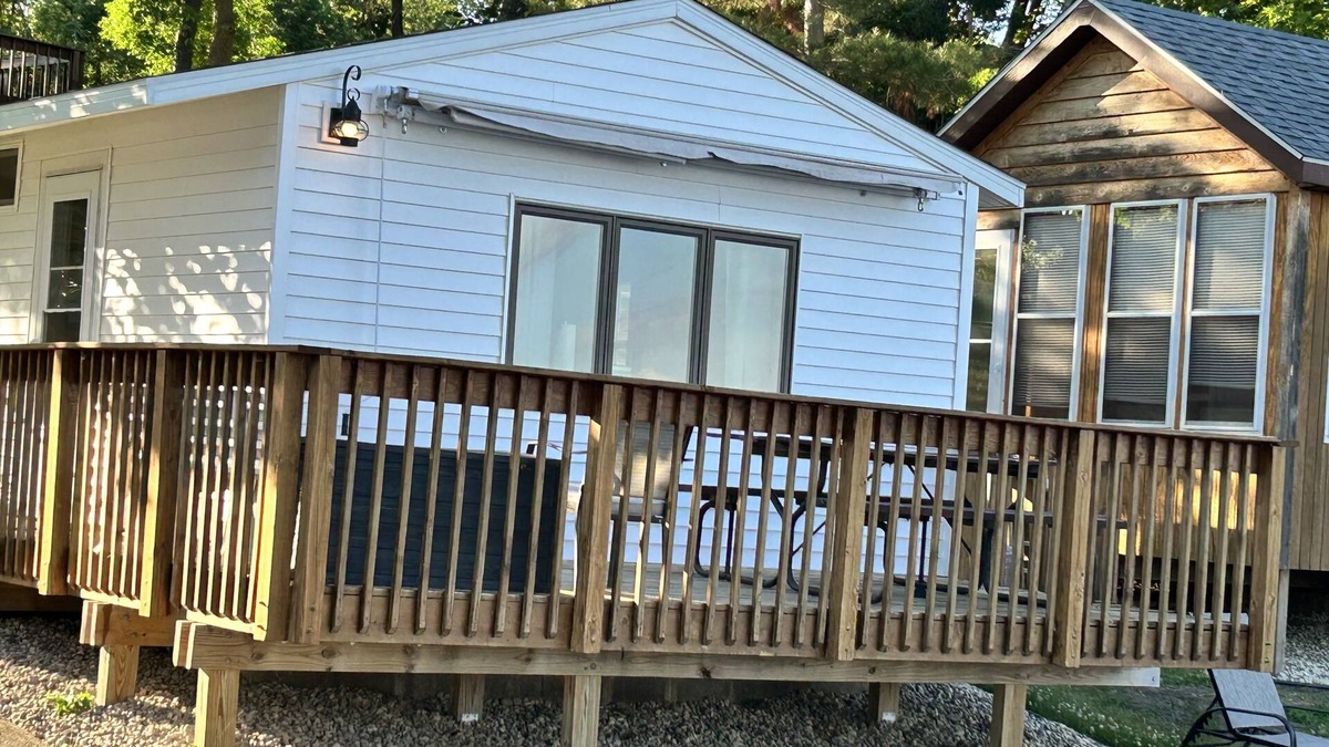 Alexandria Cabin | Modern lakeside cabin with panoramic views and deck.