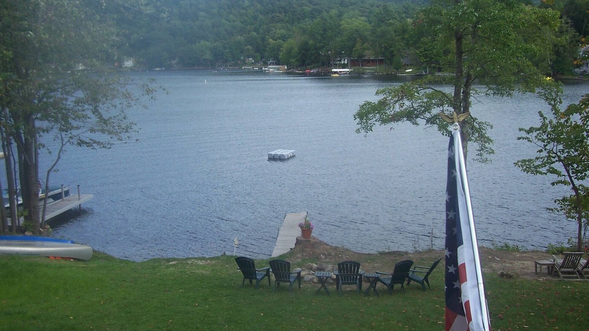 Wells Ski Chalet | Modern Log Home with 70 feet of lakefront! Great Fishing and Swimming!