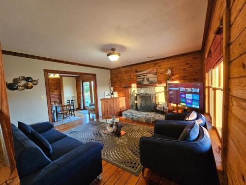 Winchester House | Modern Log House First Level Primary