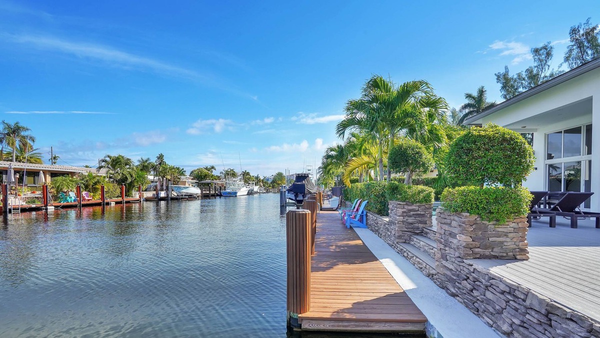 Pompano Isles House | Modern Luxury Waterfront Heated Pool Home