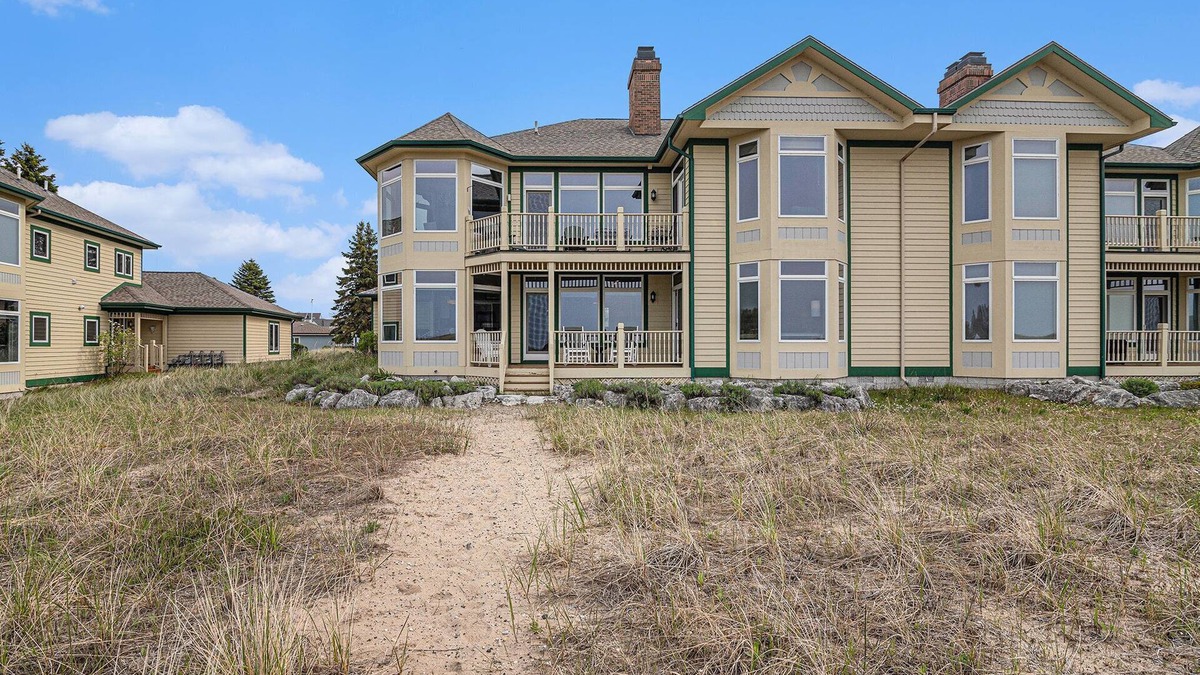 Manistee Condo | Modern Main Floor Waterfront Condo