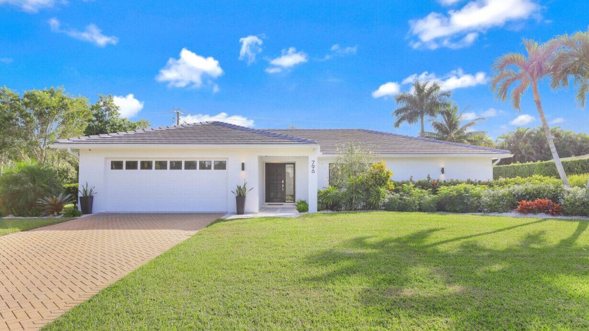 Moorings House | Modern Oasis: Private Beach Access. Minutes from Downtown & Optional Golf Cart