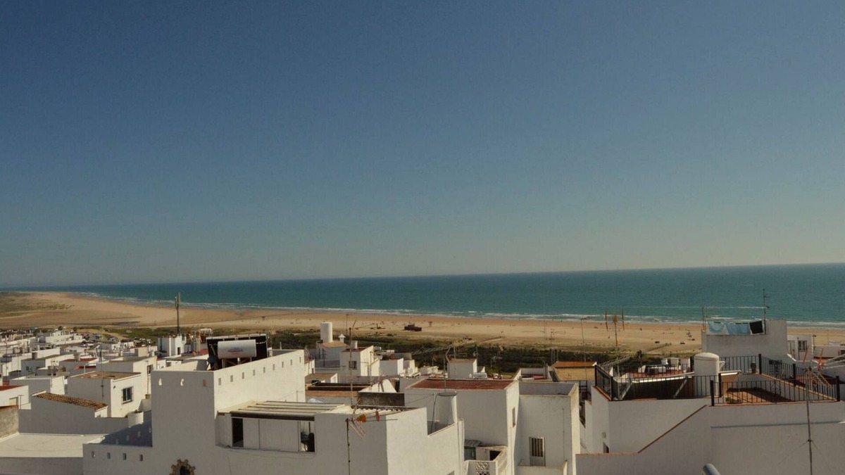 Conil de la Frontera City Center House | Modern town house with sea view, large roof terrace with shower * WLAN * KLIMA *