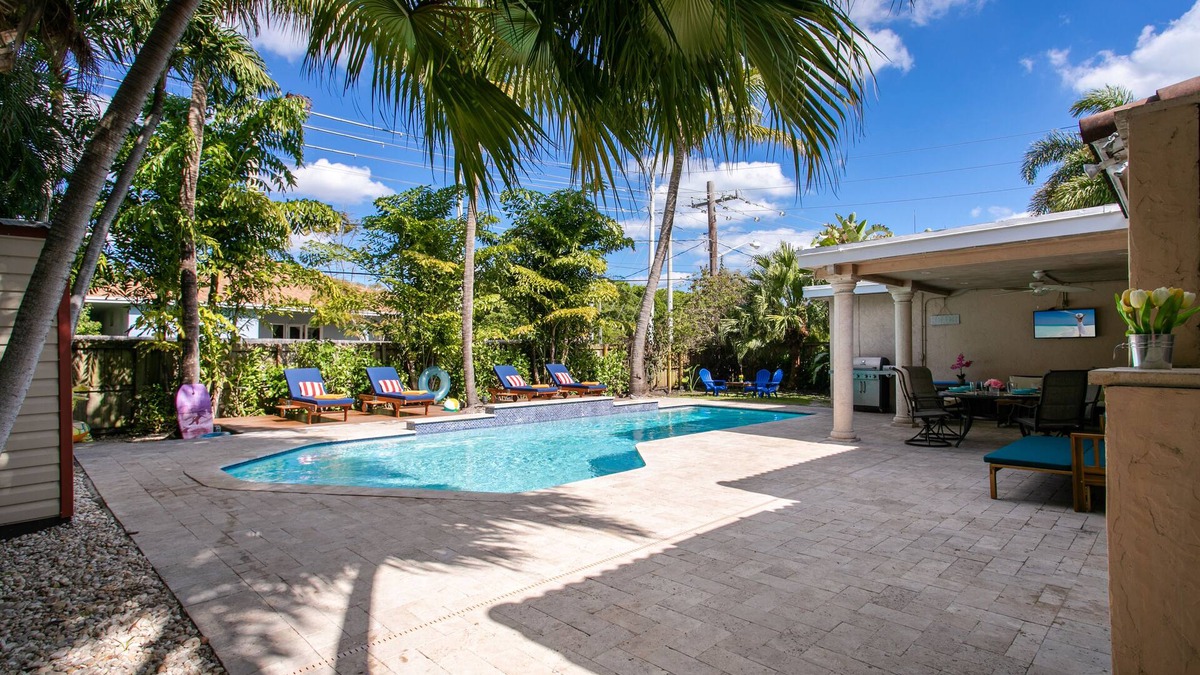 Dania Beach House | Modern Tropical Villa with Heated Salt Water Pool & Hot Tub by the Beach!