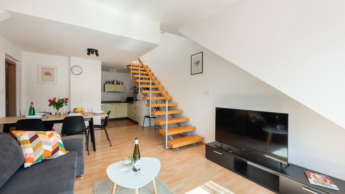 Smichov Apartment | Modern two-level apartment with balcony
