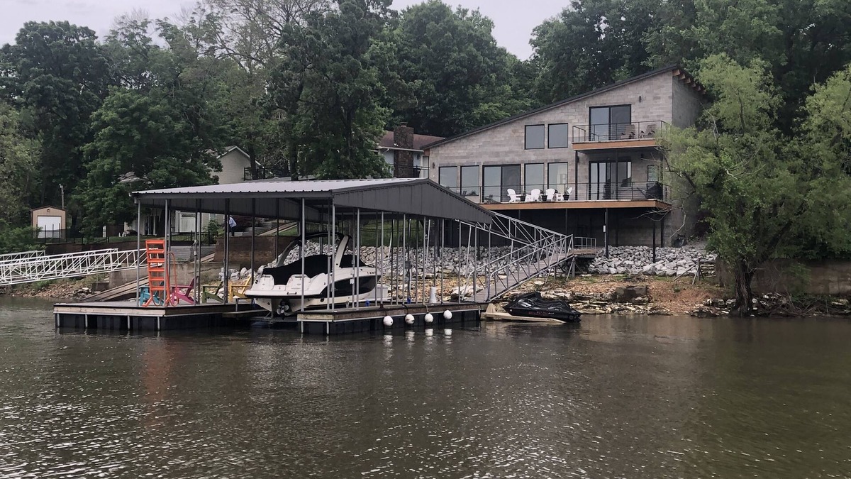 Afton House | Modern waterfront home on Monkey Island with dock