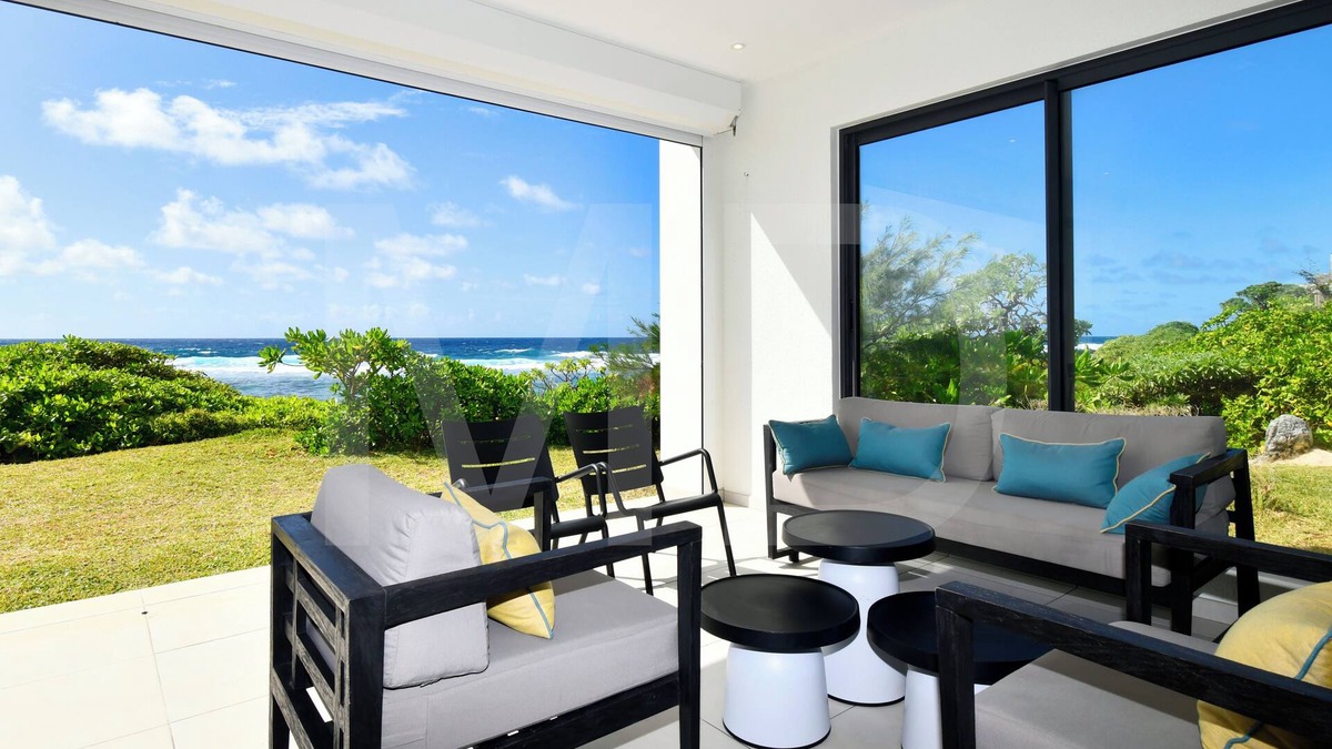 Poste Lafayette Villa | Modern White and Blue on the beach with pool