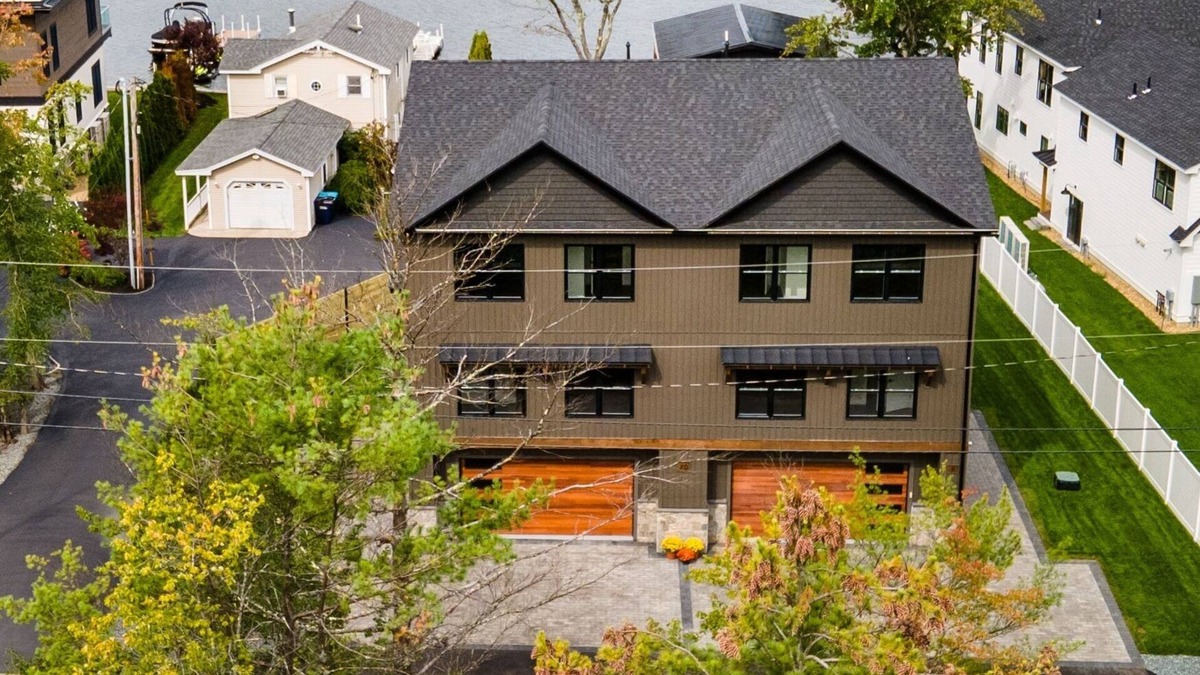 Lochmere House | Modern Winnisquam Lake House sleeps 10 Jacuzzi & Boat Slip
