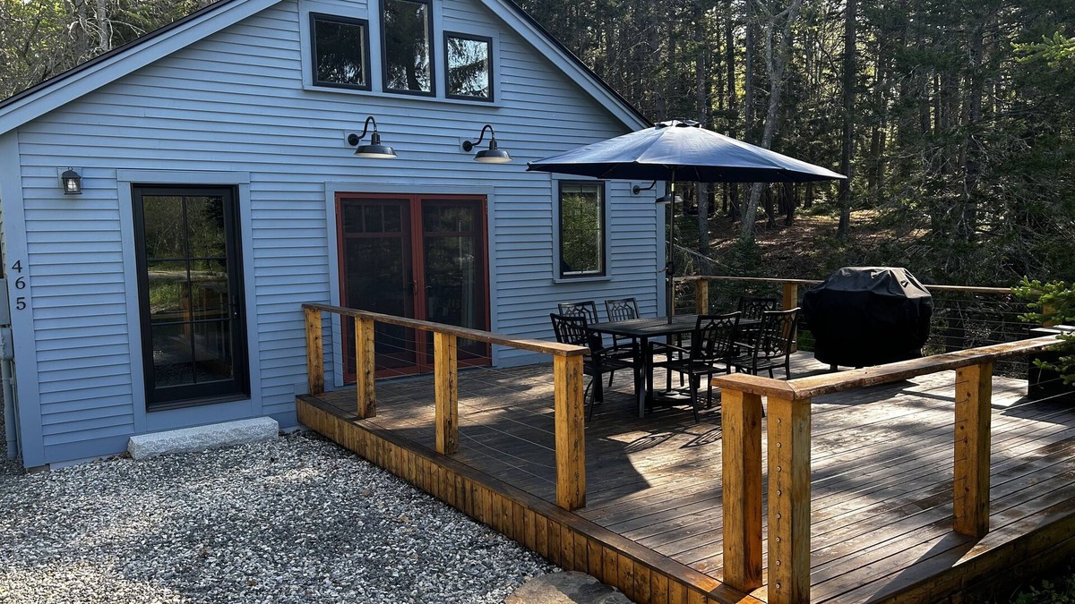 Isle of Springs Cottage | Modern woodland privacy with ocean, trails, and lobster all in walking distance.