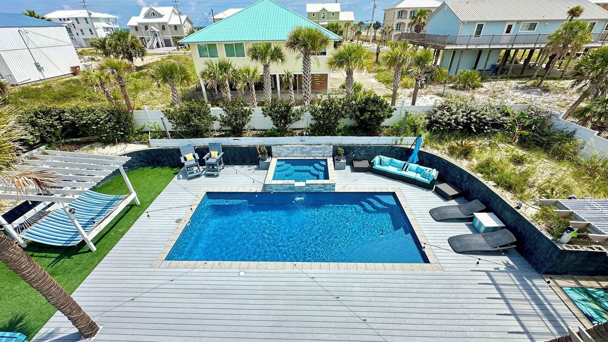 Navarre Beach House | Most Private Oasis On The Island-Heated Pool, Huge Backyard,Grilling,TV,Firepit.
