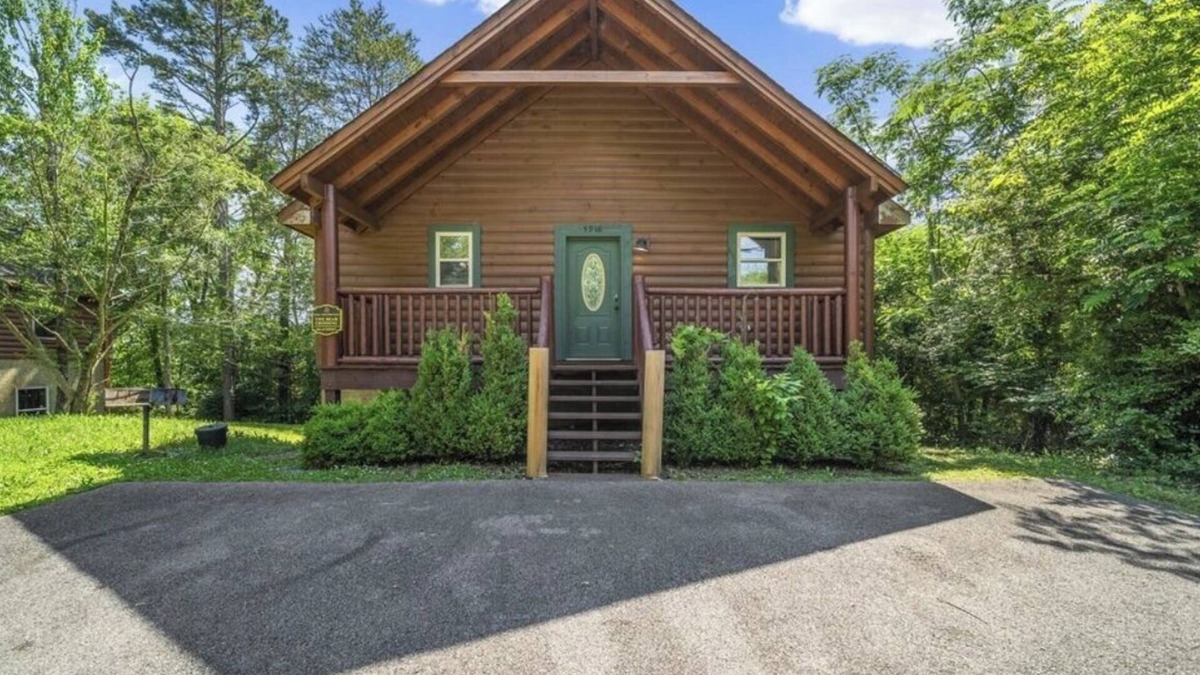 Pigeon Forge Cabin | Mountain and River Views: hot tub ~ pool table~ movie theater ~ fire pit
