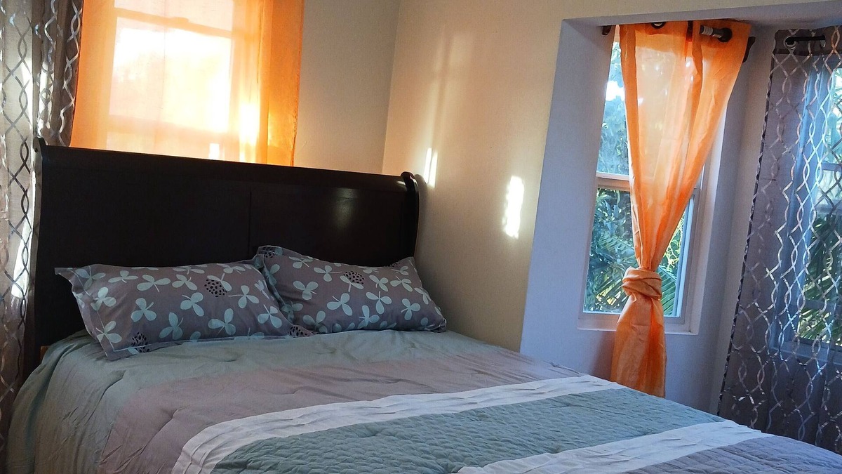 Sandy Point Town House | Mountain and Sea View Stay