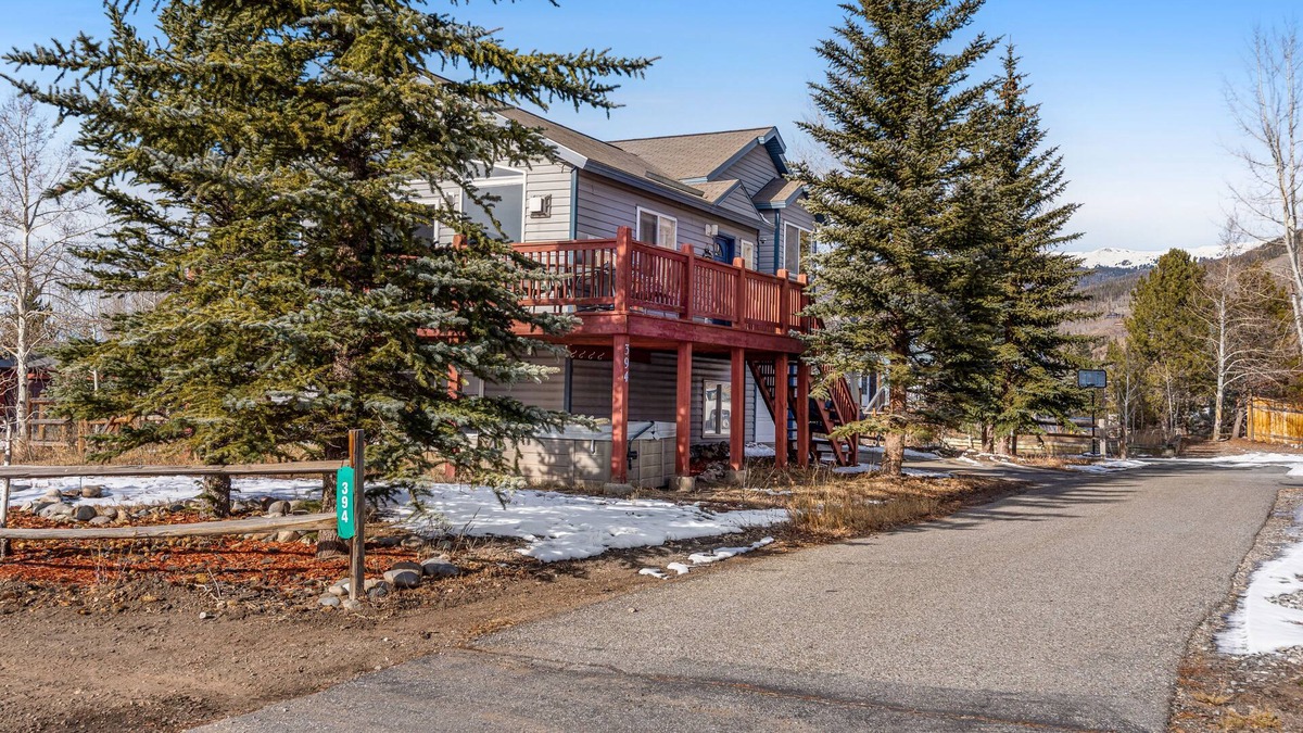 Willow Grove House | Mountain view home with private hot tub, fireplace, charming interior & deck