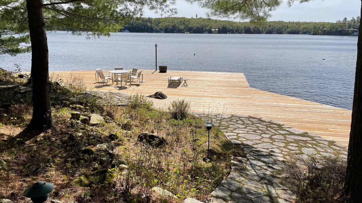 Port Carling Cottage | Muskoka Lakes Cottage with huge dock. Southwest & sunset view