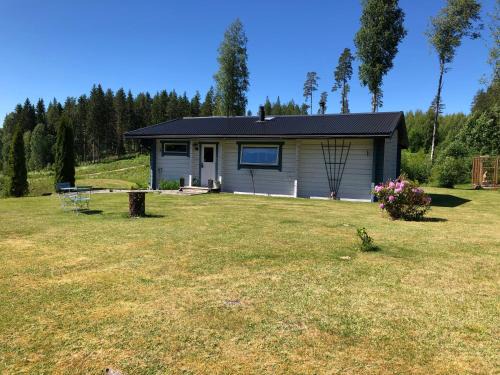 Torsby Villa | Mysig timmerstuga med braskamin nära Hovfjället