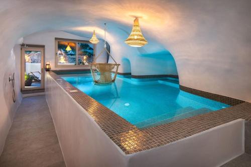 Messaria Villa | Mystagoge Retreat cave with an indoor pool and gym