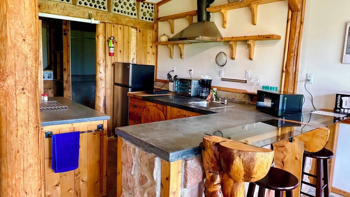 Cymbria Cottage | Natural Home Built in Earthship Style on Waterfront Property