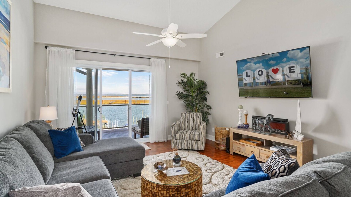 Chincoteague Condo | Nauti Girl - Sunset Bay Villa 310 - Waterfront, Pool, Boat Slip, Dog Friendly!