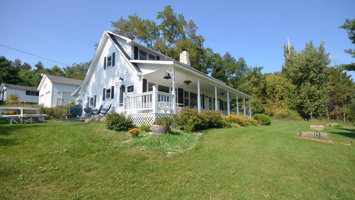 Rapid City House | Near Torch Lake. Home w/guest cabins for family retreat. Dogs ok
