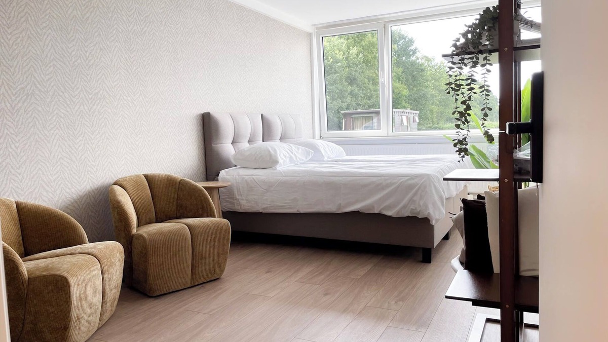Municipality of Tilburg Apartment | Need a quiet place to recharge? This cozy room is minutes from University Tilburg and surrounded by nature. Shared kitchen, laundry, and free parking included.