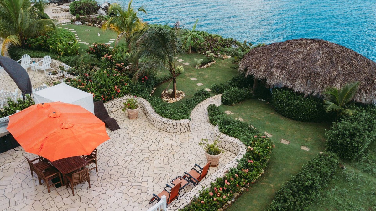 Orange Bay House | Negril Bungalow Paradise overlooking cliffs with Private Snorkeling Entrance.
