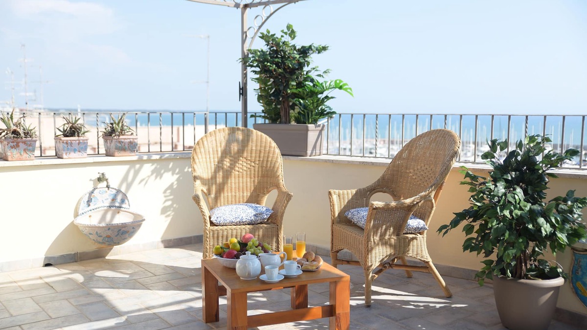 Nettuno Apartment | Neptune holiday home, penthouse and penthouse in the sea view village near beaches