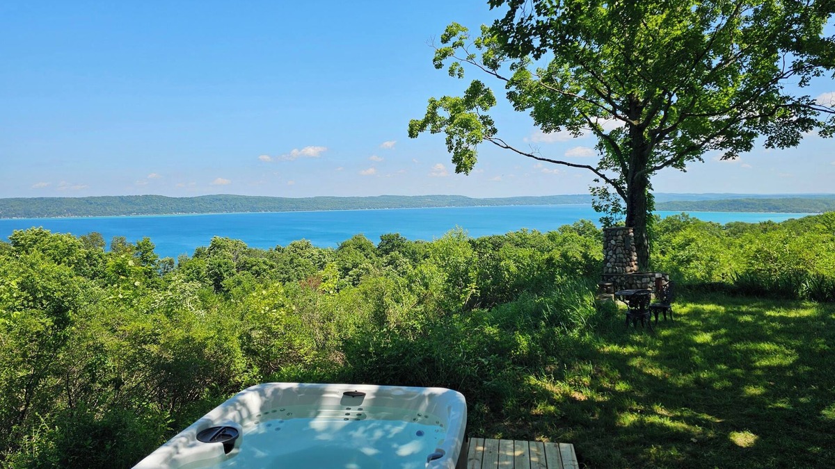 Frankfort Cottage | New! Above Crystal Lake - Hot Tub and Stunning Hilltop Views for Stargazers and Nature Lovers! Window A/C Unit in Bedroom!