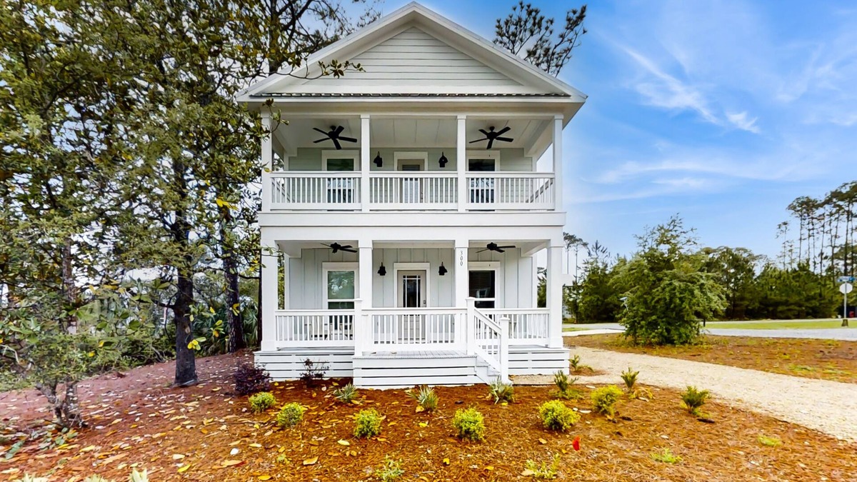 Carrabelle House | New dog-friendly home near beach & golf with pool, arcade game, decks, W/D, AC