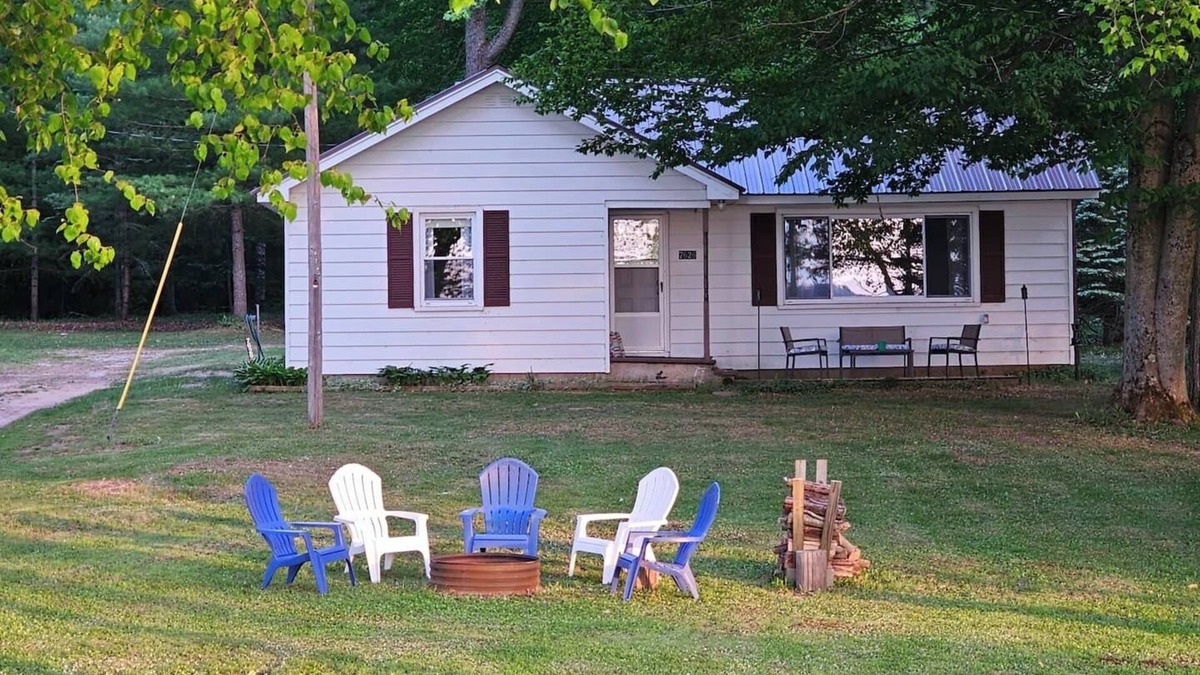 Kalkaska Cottage | New! Forrest’s Cabin - Lakefront with Sunset Views and Private Dock!