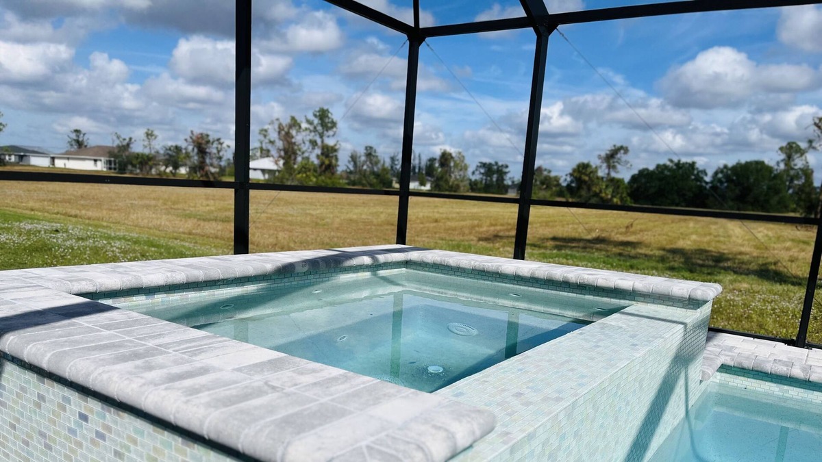 Jacarandas House | New heated pool/spa overlooking natural florida preserve.