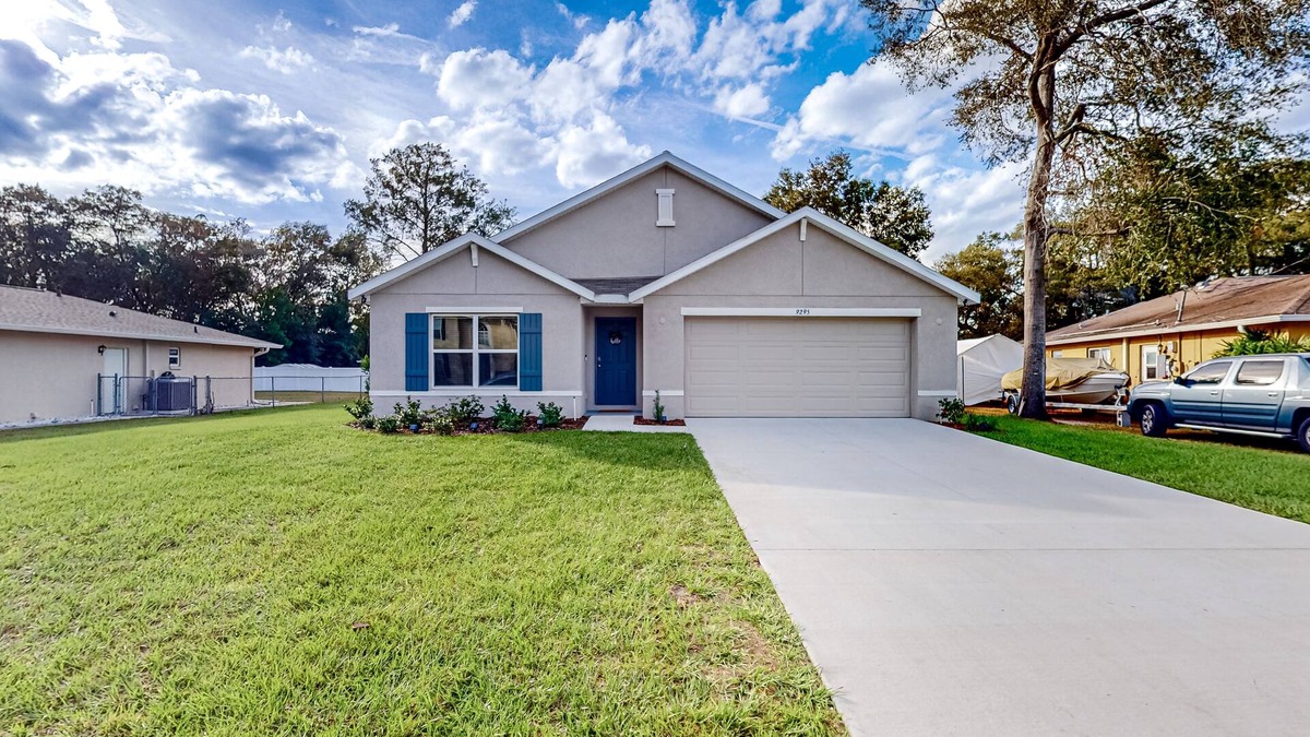 Spring Hill House | New home with large yard, covered patio, grill, central AC, & W/D