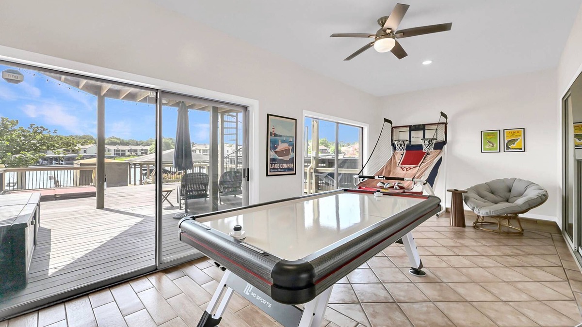 April Sound House | NEW! Lakeview 4BR Townhome | Spacious, Private Hot Tub, Game Room, Family-Friendly