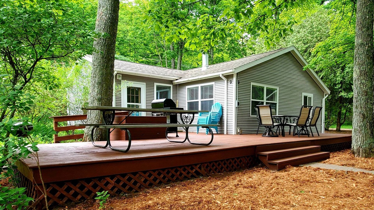 Traverse City Cottage | New Listing! 3br cottage on Lake Leelanau with beach, boat launch, playground!