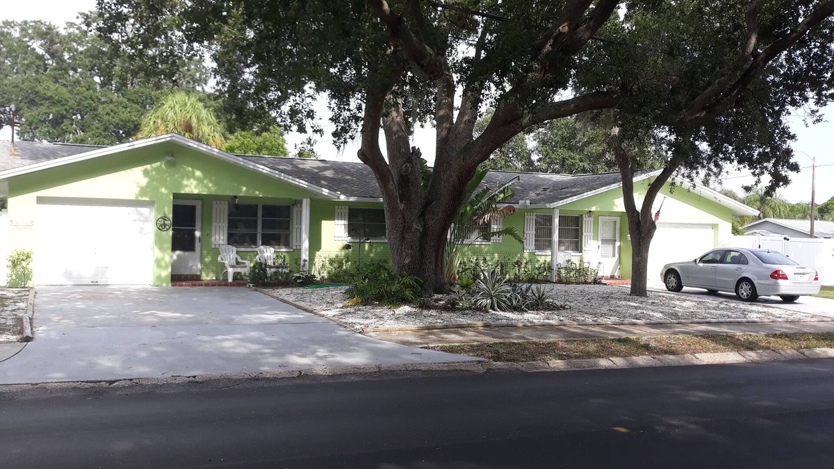 Dunedin House | New Listing! "CHAMPER S CORNER . . . the ultimate stay-cation"