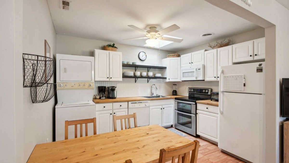 Village Green Condo | NEW LISTING! Cozy 2BR Condo - Beachside Bliss with Yard Space