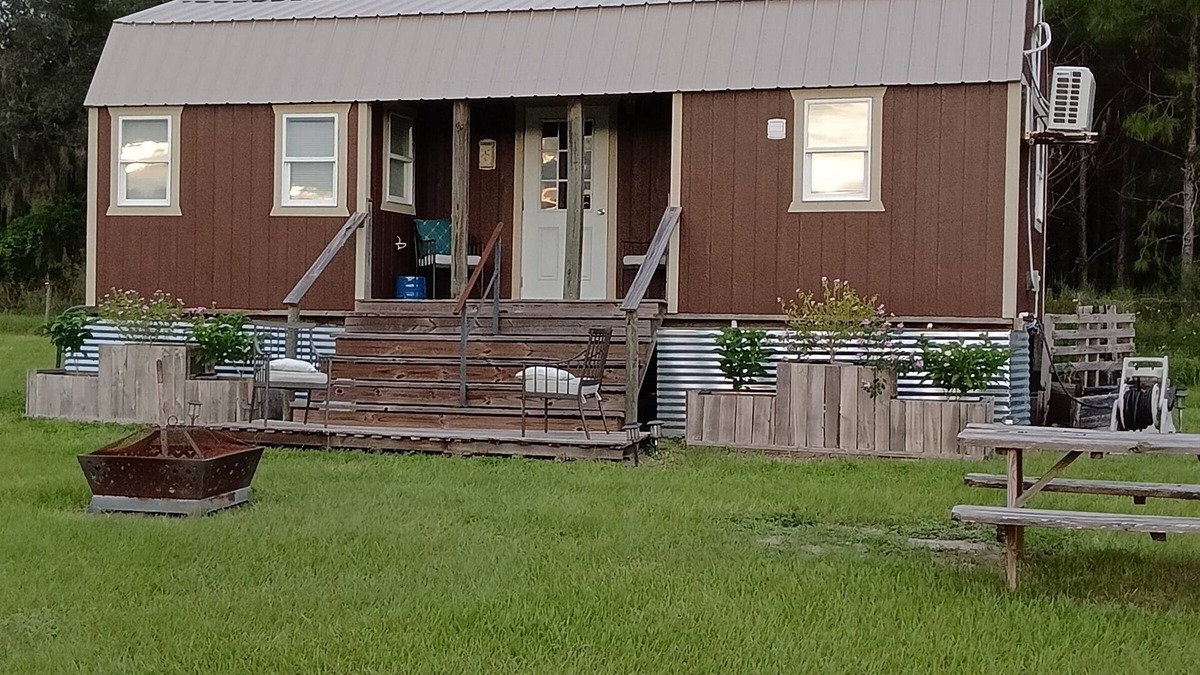 Howey-in-the-Hills House | New luxury Tiny House(s) on 6 acres with horses. Sunsets,fire pit, & Hot tub.