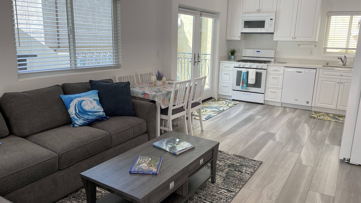 The Strand House | New ocean front duplex, walk to dining, shops & entertainment.