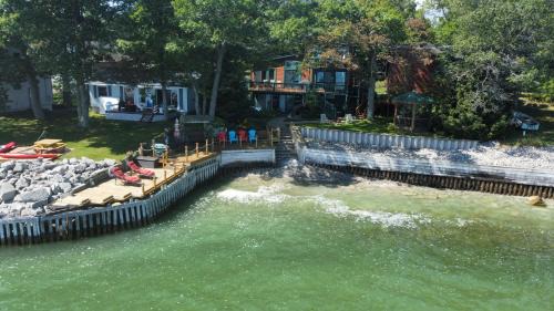 Northeastern Michigan Apartment | New! Schmidt's Cove - Amazing Private Lakefront!
