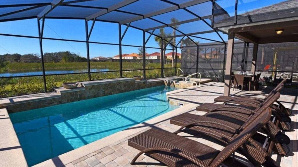 Loughman Villa | NEW! Spacious 5-Bedroom Resort Pool Home with Lake View