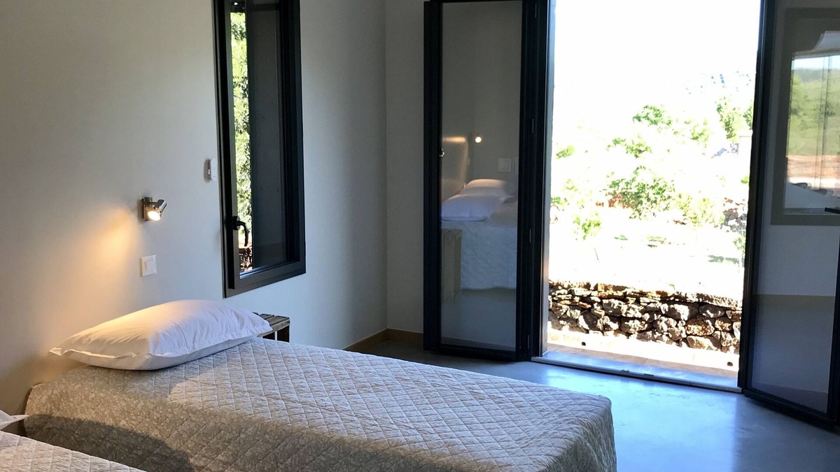 Les Vans House | New stone and wood house with swimming pool