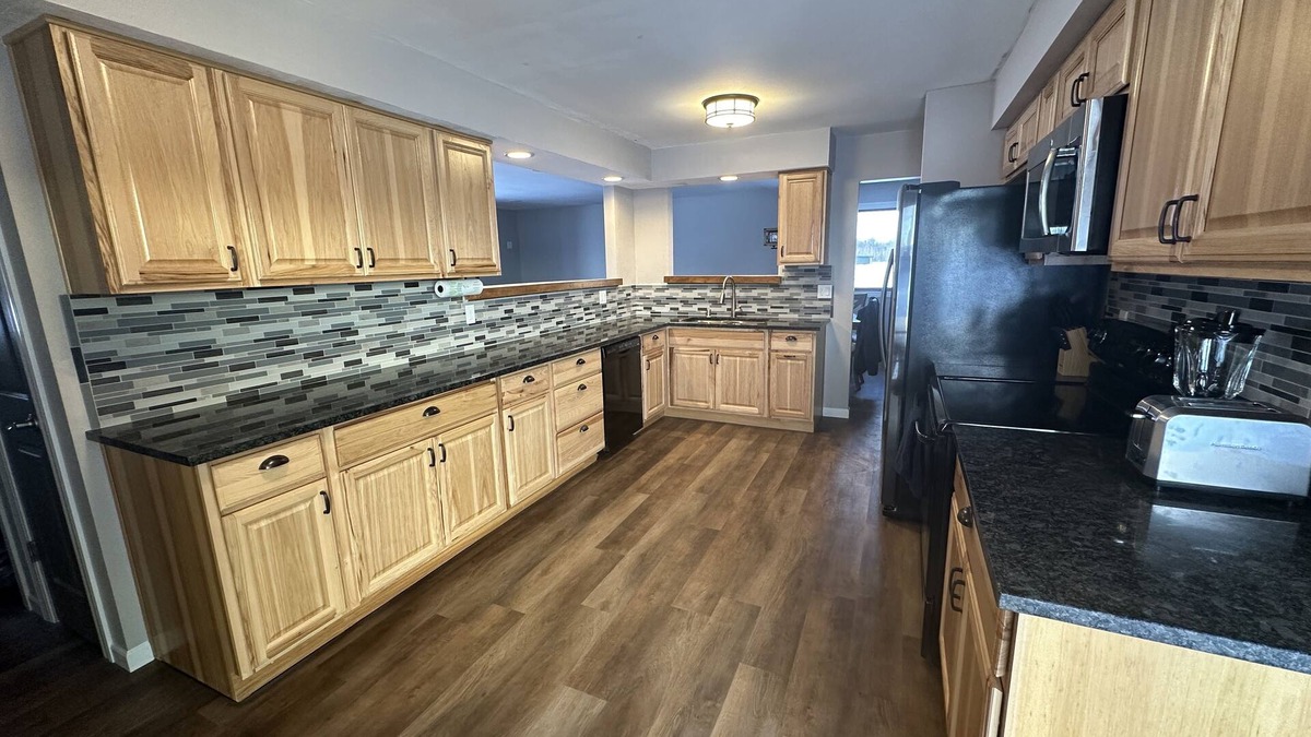 Waldo House | NEW Three bedroom ranch style pet friendly home with a patio & theatre room!