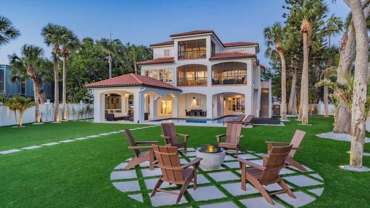 Palm Harbor House | NEW Waterfront 6 bedroom home with large pool and luxurious outdoor living area!