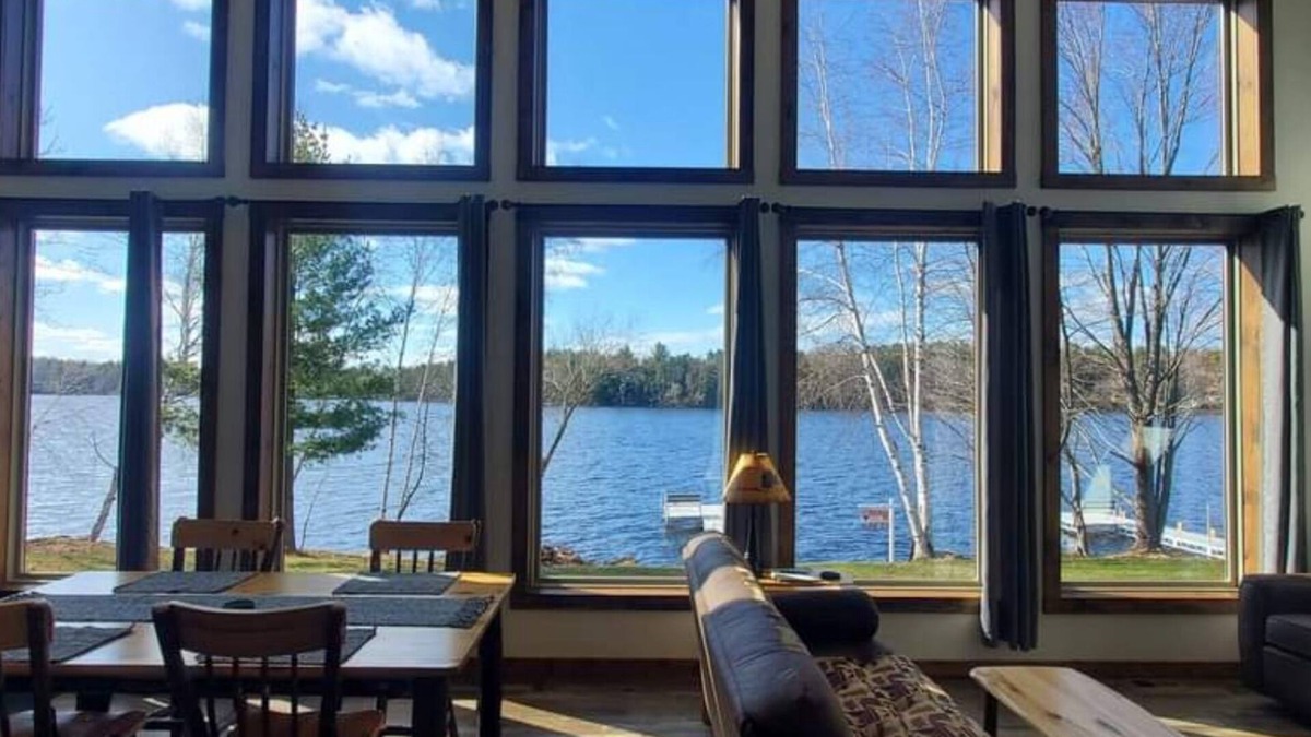 Phillips Cabin | New waterfront cabin with expansive lake-facing windows, Long Lake, Phillips
