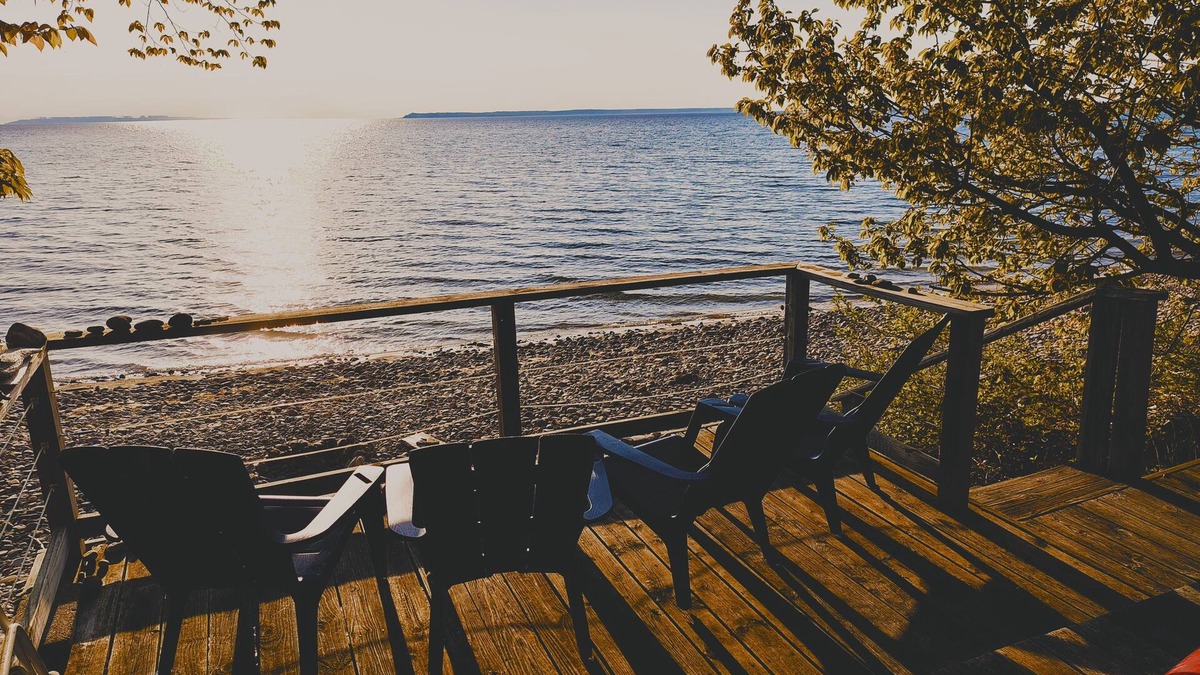 Lake Leelanau Cottage | NEW! Waterfront Cottage on private Lake Michigan Beach with glorious sunsets